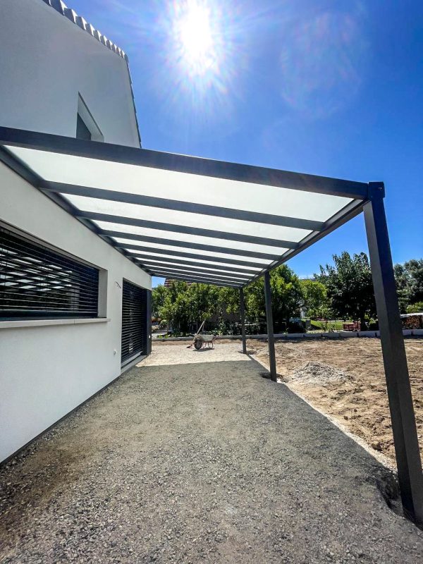 Wall-mounted carports with glass